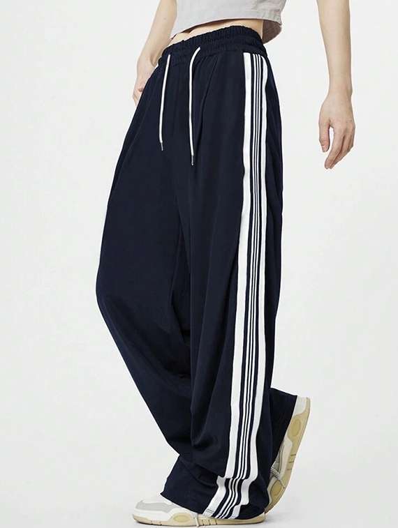 women solid mid rise track pant