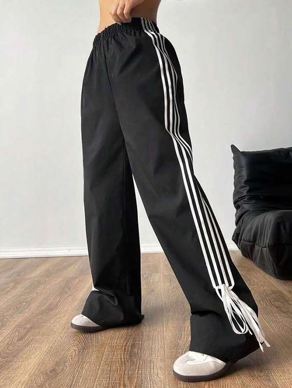 women solid mid rise track pant