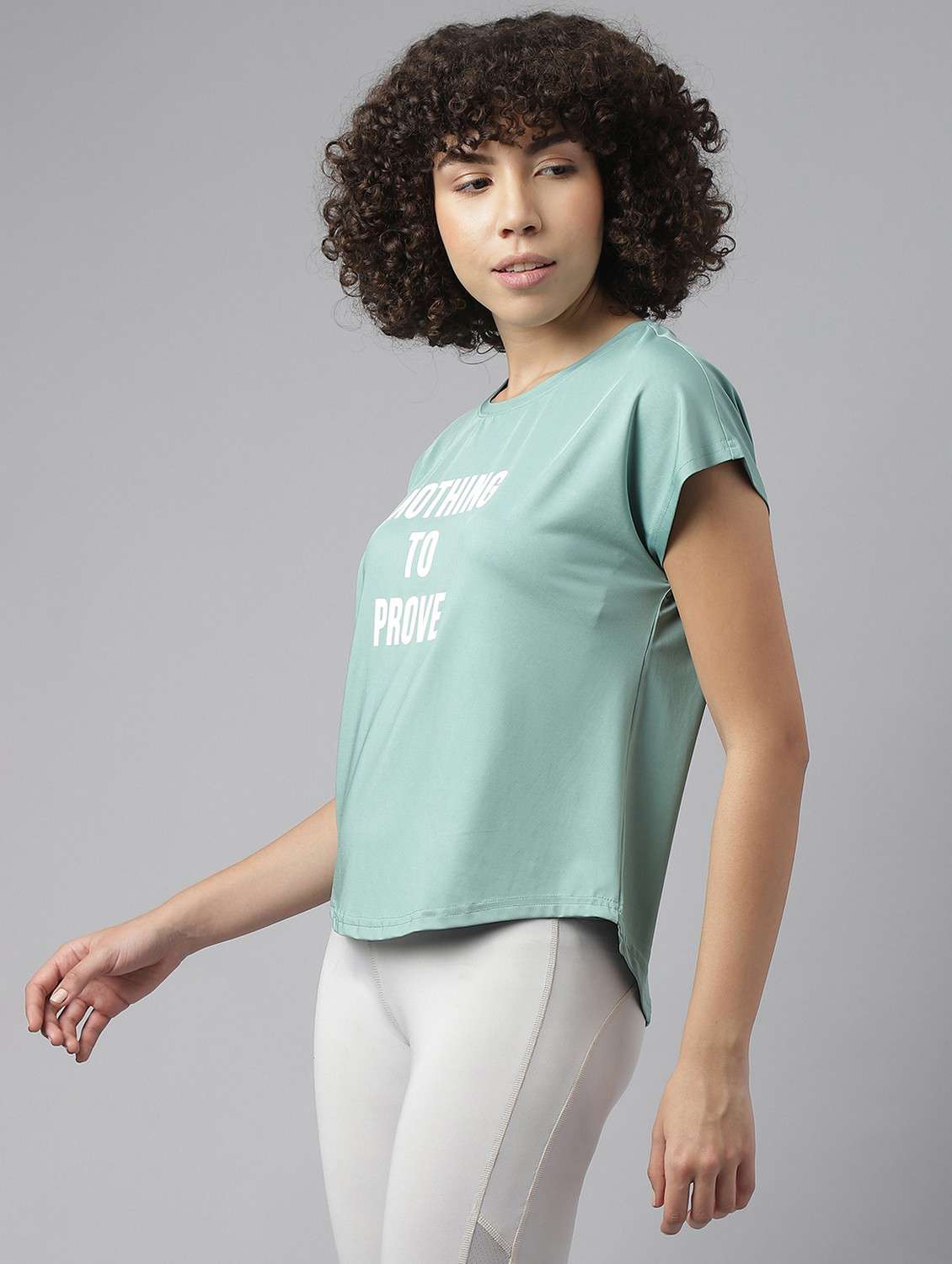 women green typographic round neck t-shirt - 21762614 -  Standard Image - 1