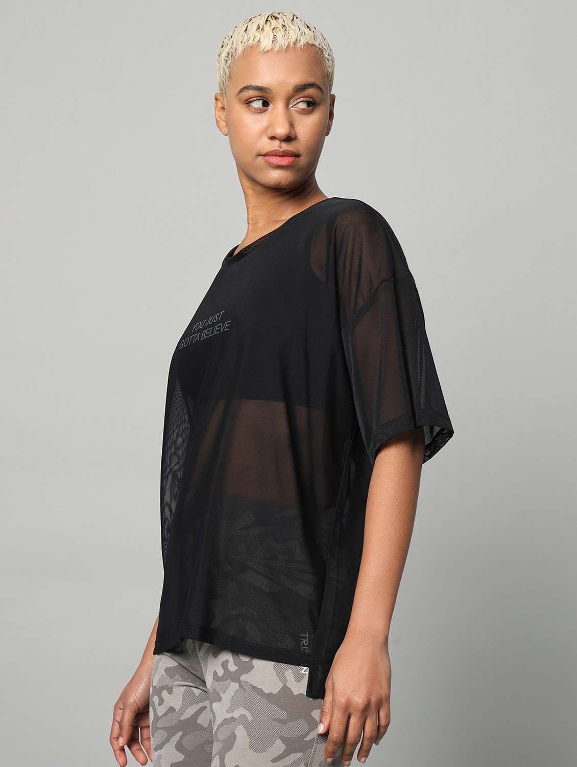 women black typographic round neck t-shirt - 21763297 -  Standard Image - 1