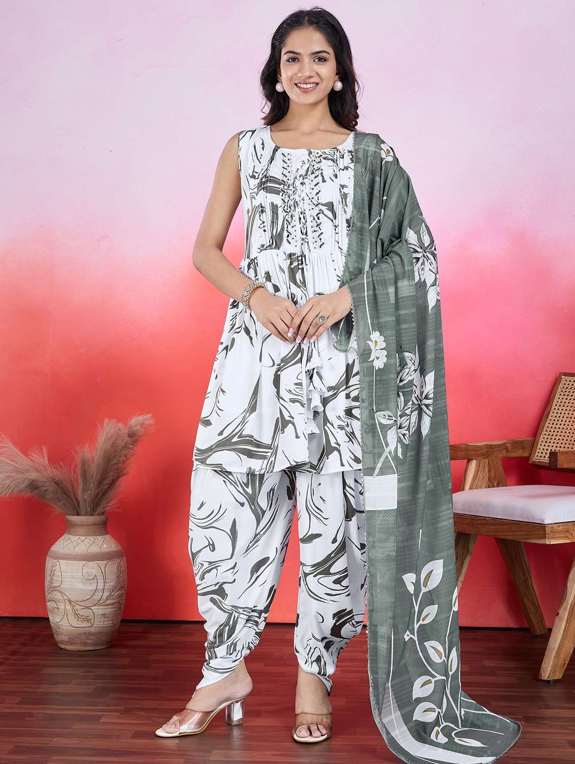 women white sleeveless dhoti kurta with dupatta set