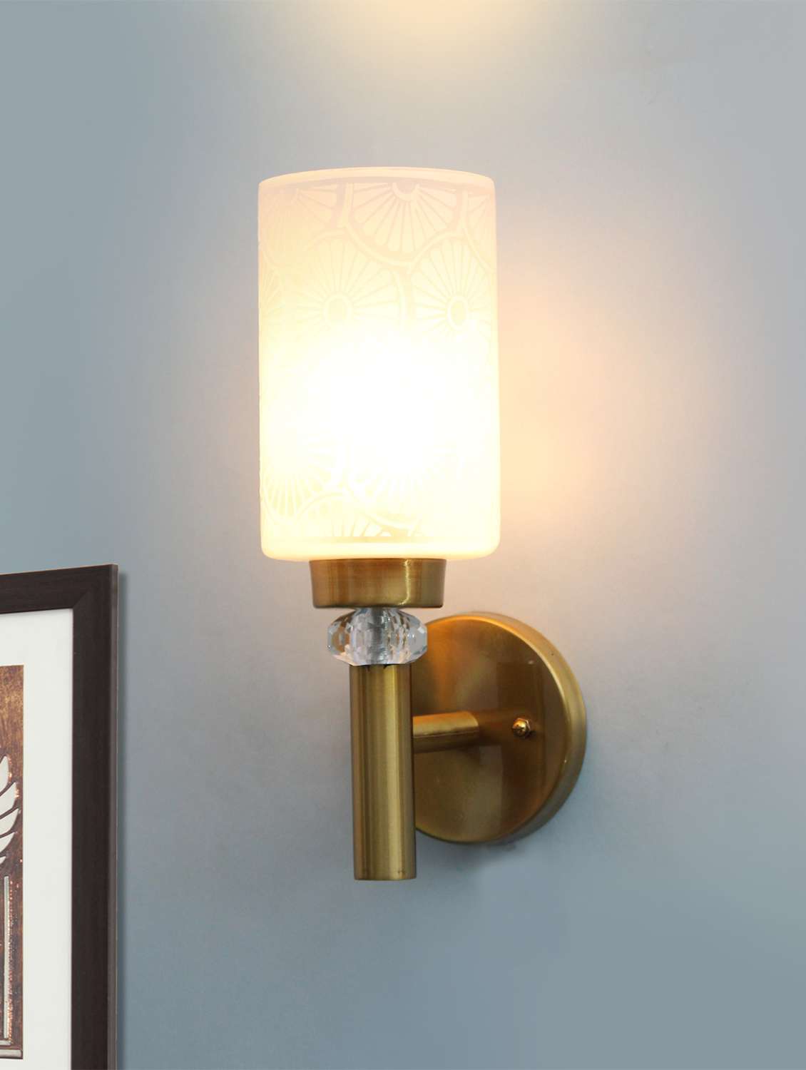 elegant golden wall light with etched design glass