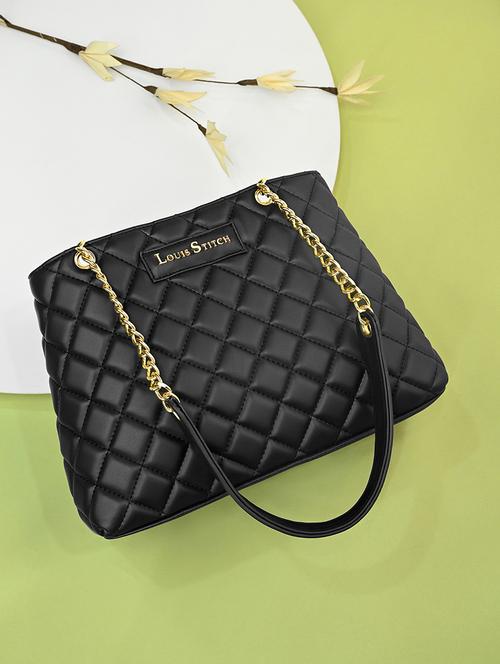 women black textured handbag - 21768089 -  Standard Image - 0
