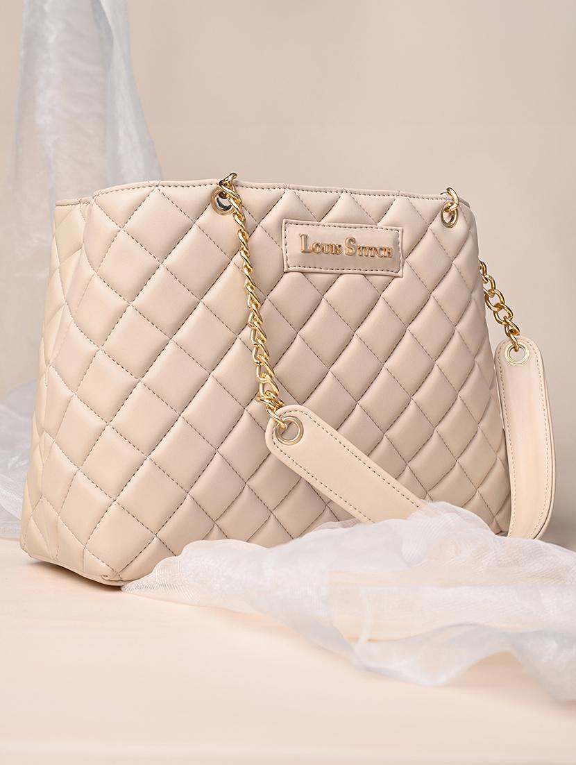 women beige textured handbag - 21768091 -  Standard Image - 1