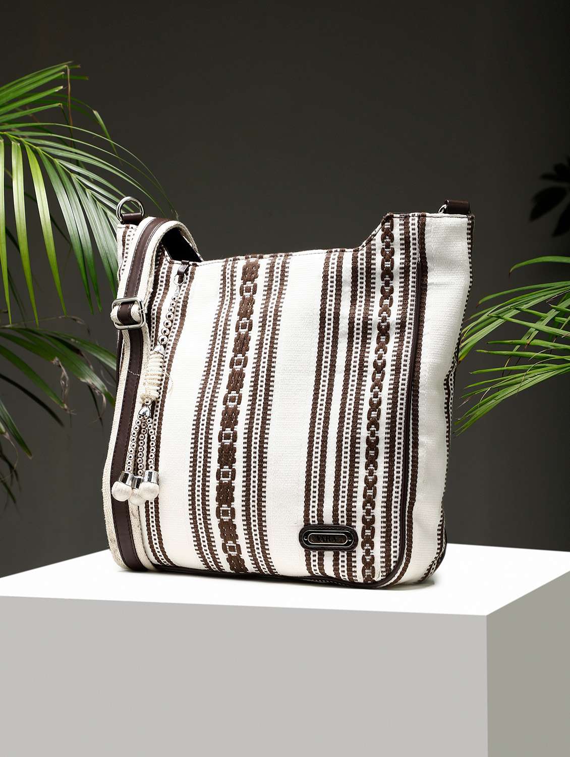 women brown striped tote bag