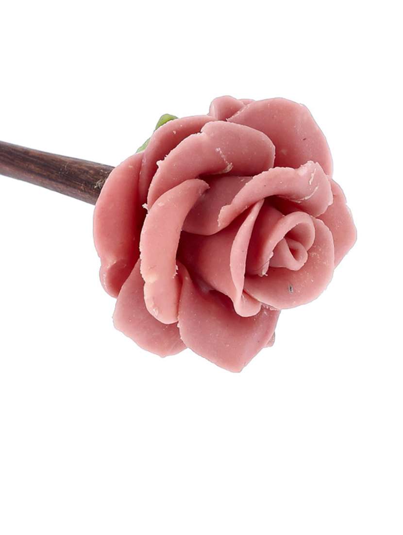 women handmade rose flower juda stick - 21787326 -  Standard Image - 1