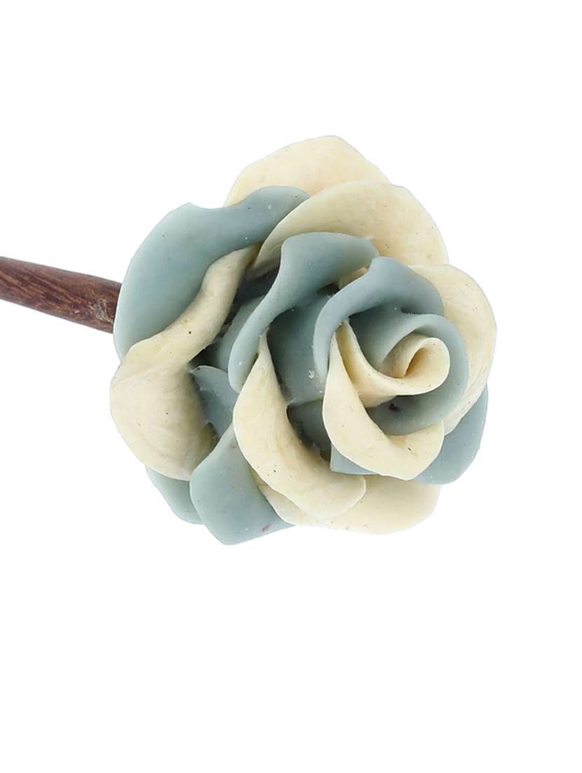 women handmade rose flower juda stick - 21787334 -  Standard Image - 1