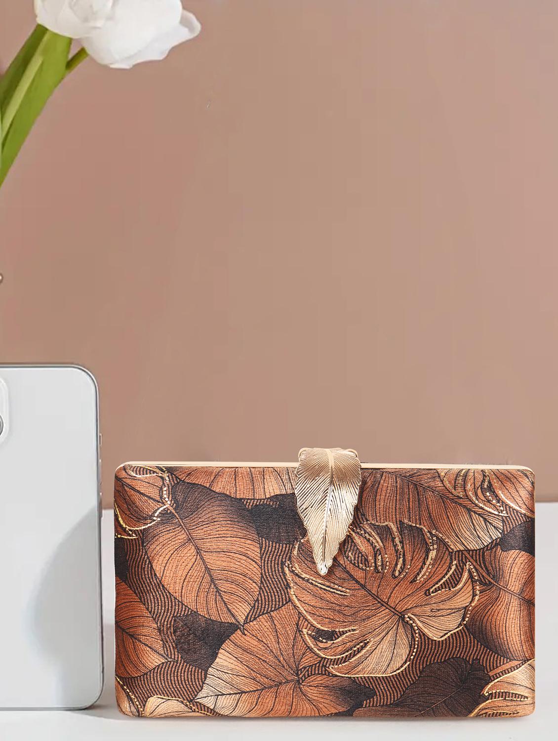 women brown twitst clasp clutch - 21791386 -  Zoom Image - 0