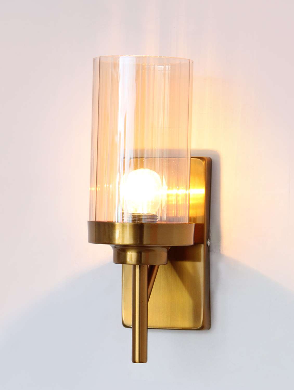 decorative wall light gold finish amber color glass