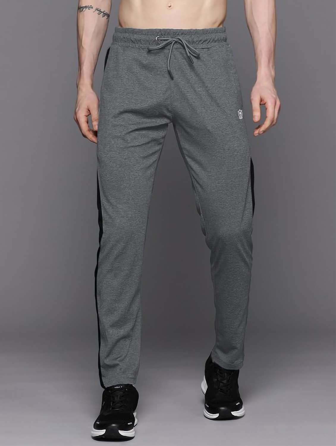 men side taped mid rise full length track pant