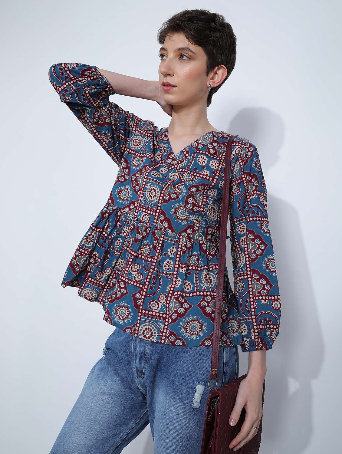 women printed overlap neck peplum top