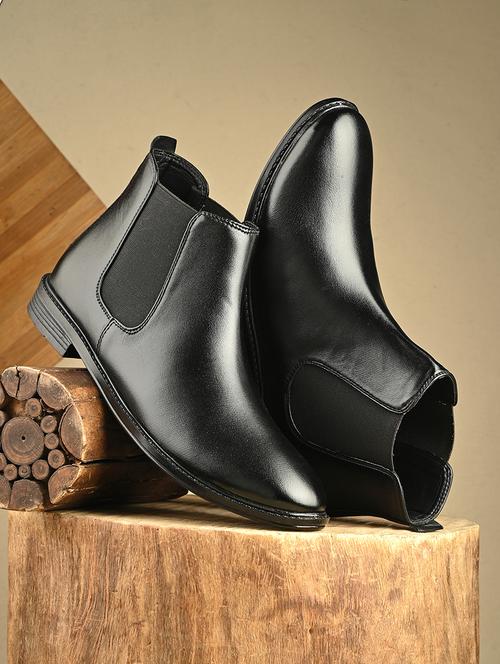 men black slip on boot - 21853503 -  Standard Image - 0