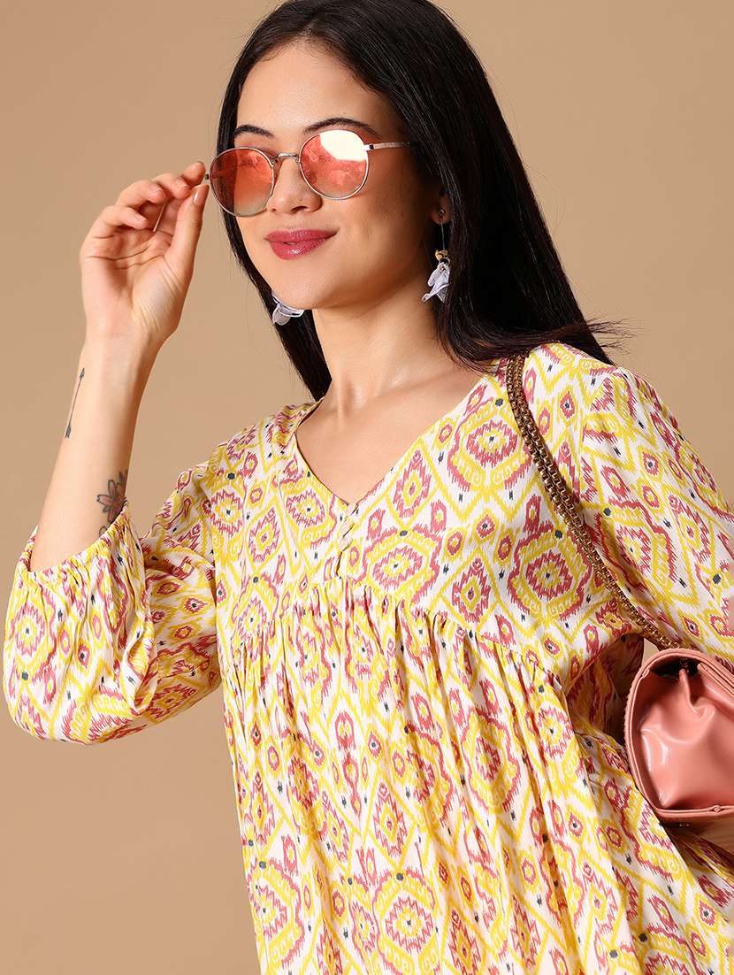 women yellow printed puff sleeve flared kurti
