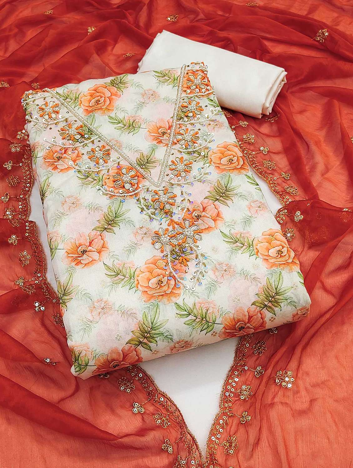 women embroidered unstitched suit set