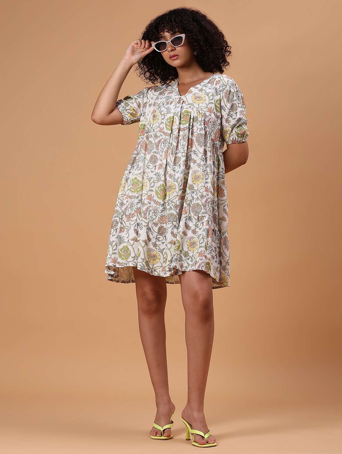 women off white floral short sleeve tiered dress