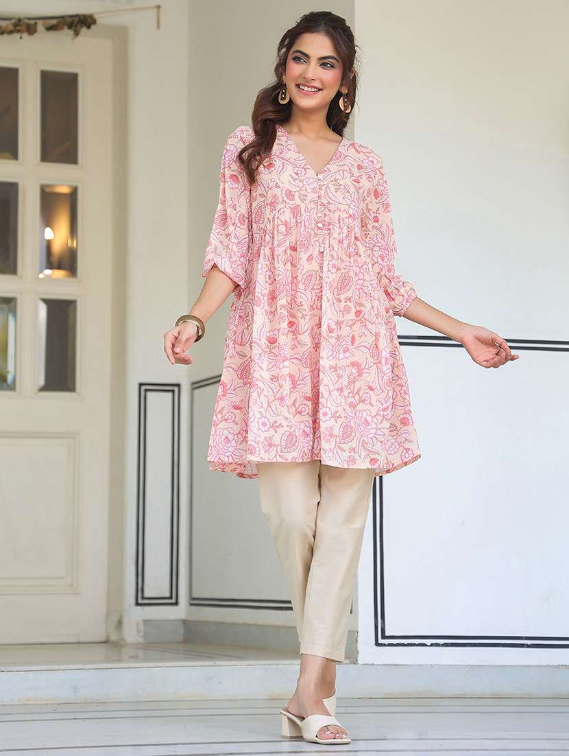 women peach floral printed flared tunic
