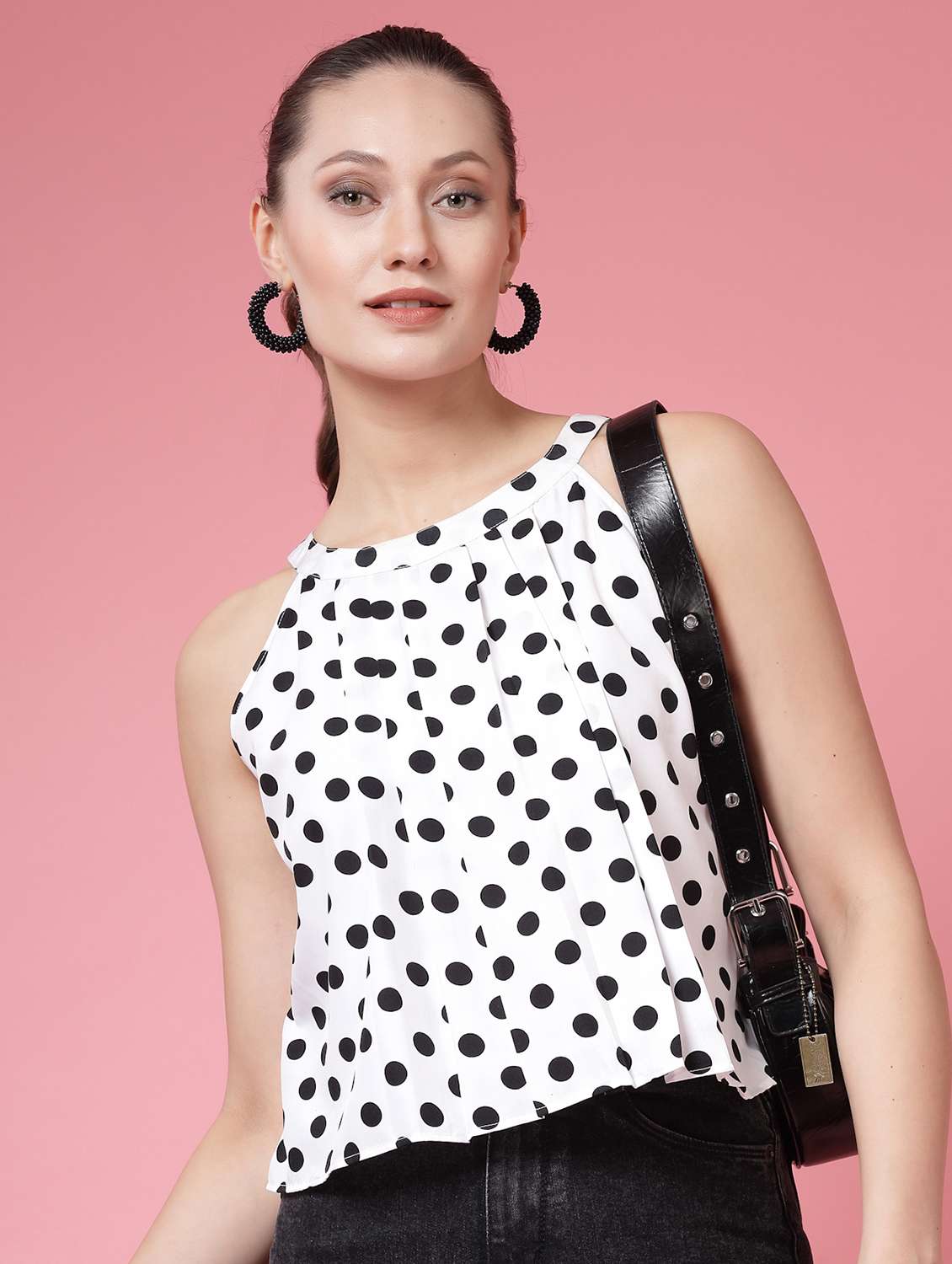 women polka doted halter neck crop top