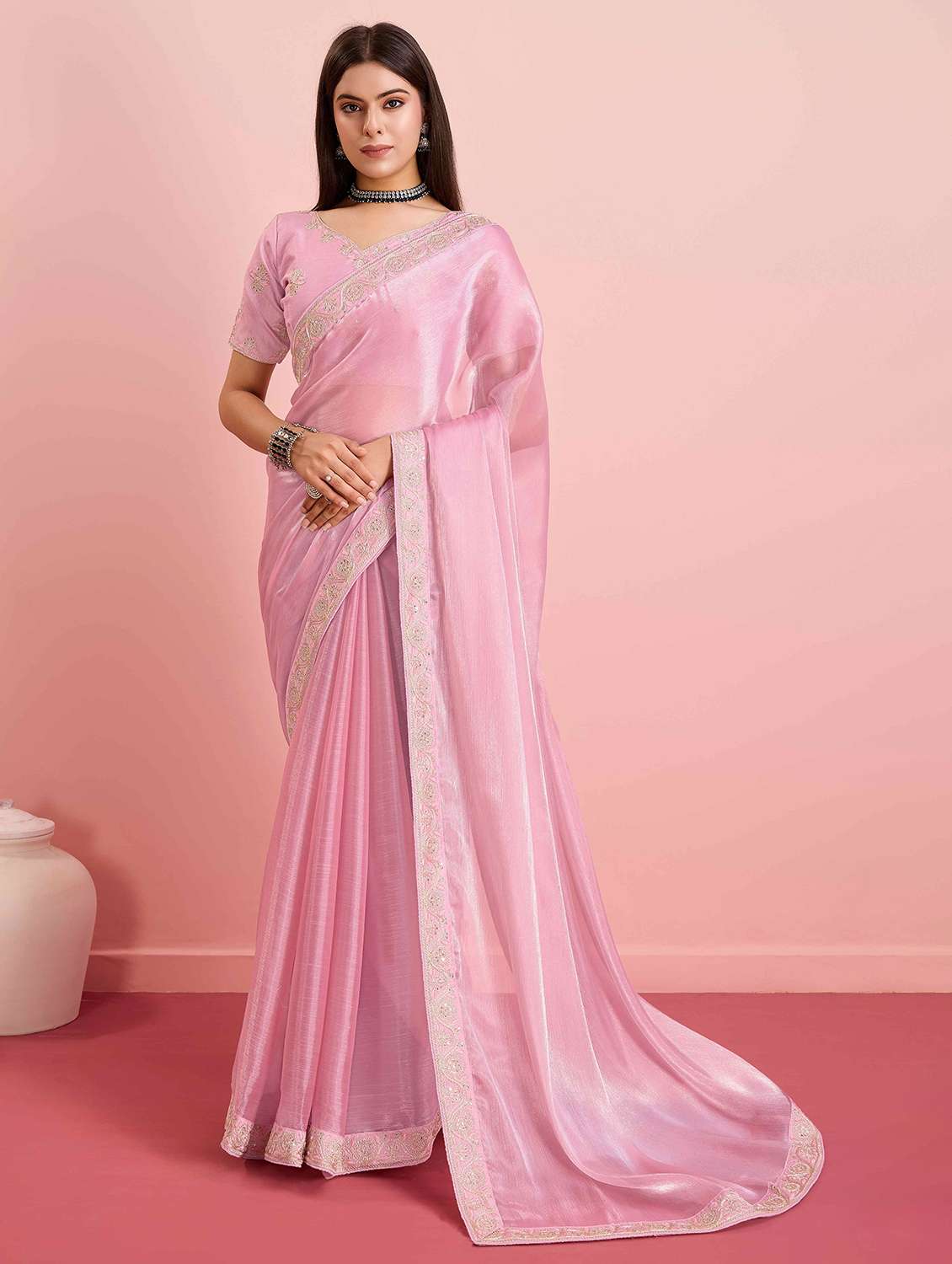 women solid with bordered saree with blouse