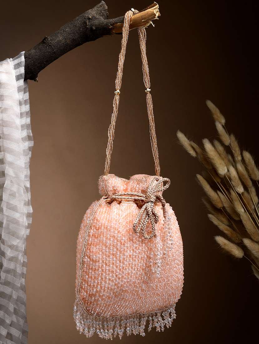 women embellished potli bag