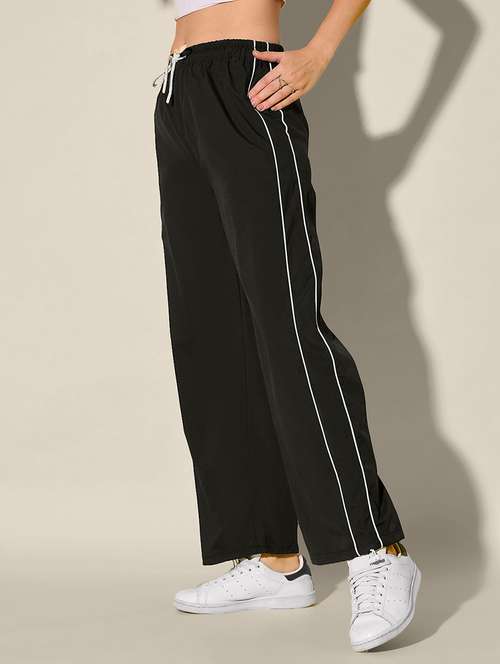 women solid high rise parachute pant