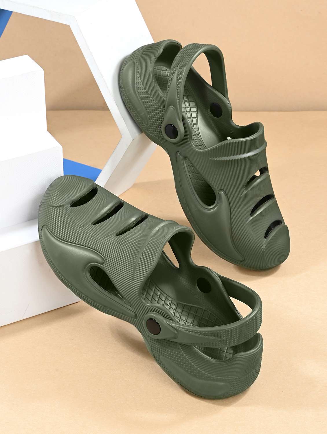 men olive solid slip on clog