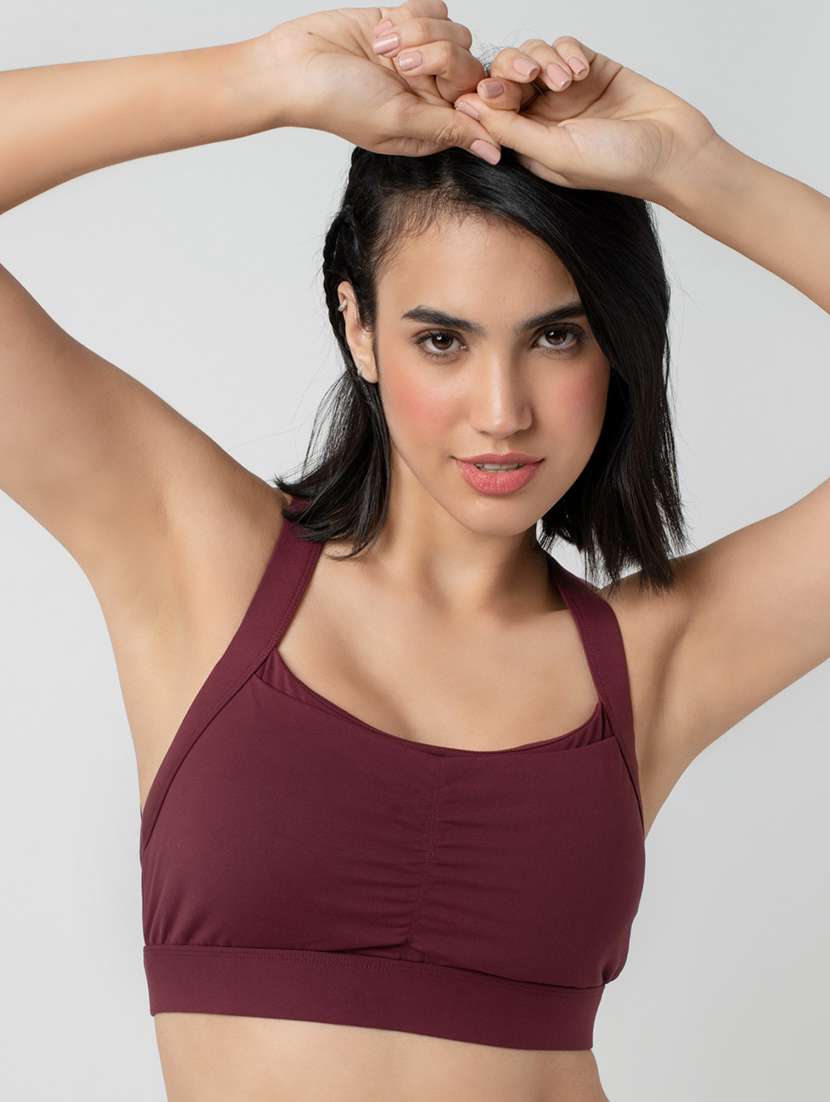 women solid lightly padded sports bra