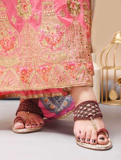 women embellished one toe kolhapuri