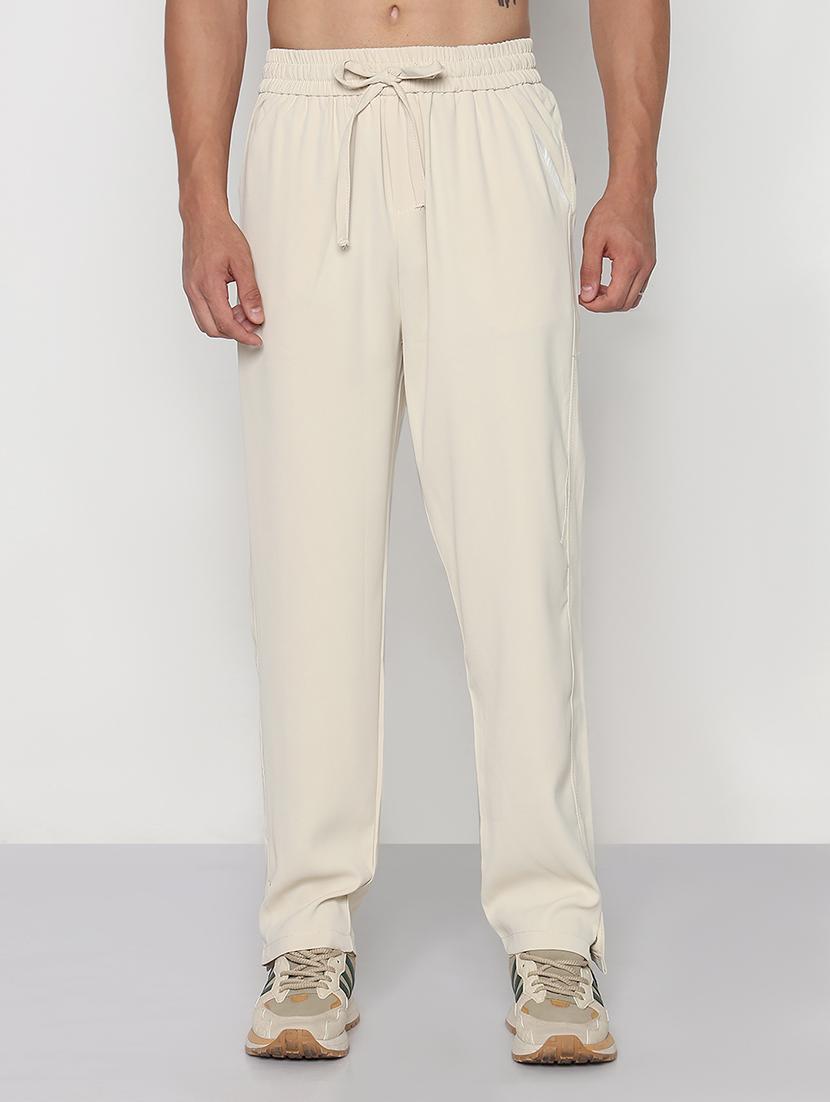 men cream solid mid rise full length track pant - 21933757 -  Standard Image - 1