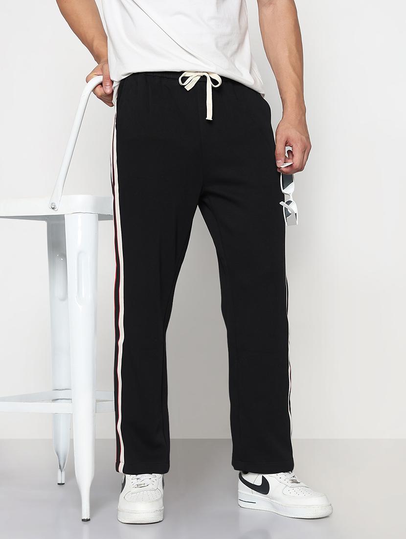 men black side taped low rise full length track pant