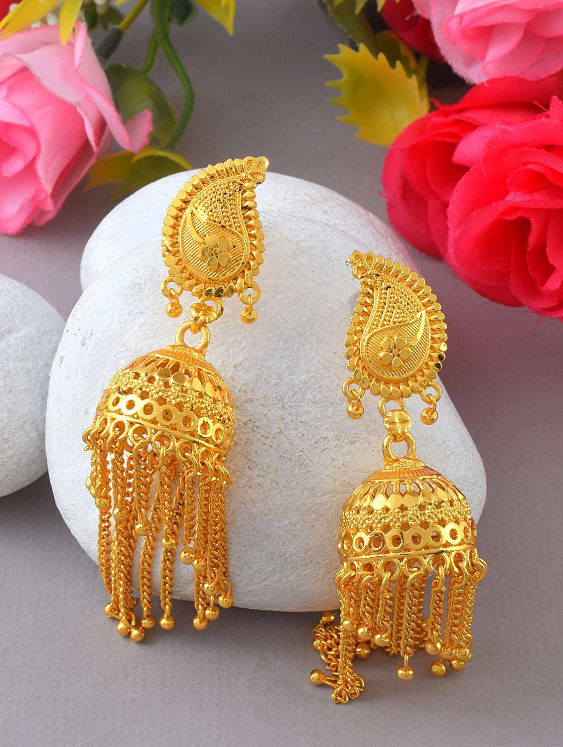 women golden jhumka earrings 