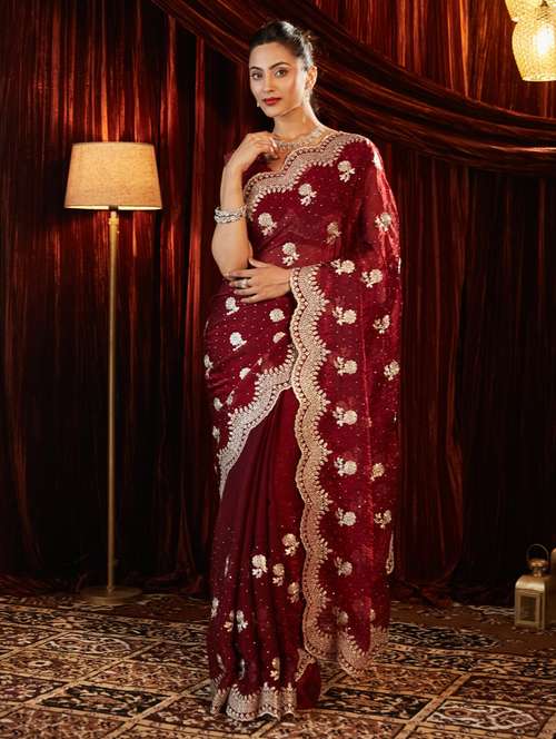 women solid with work embroidered saree with blouse