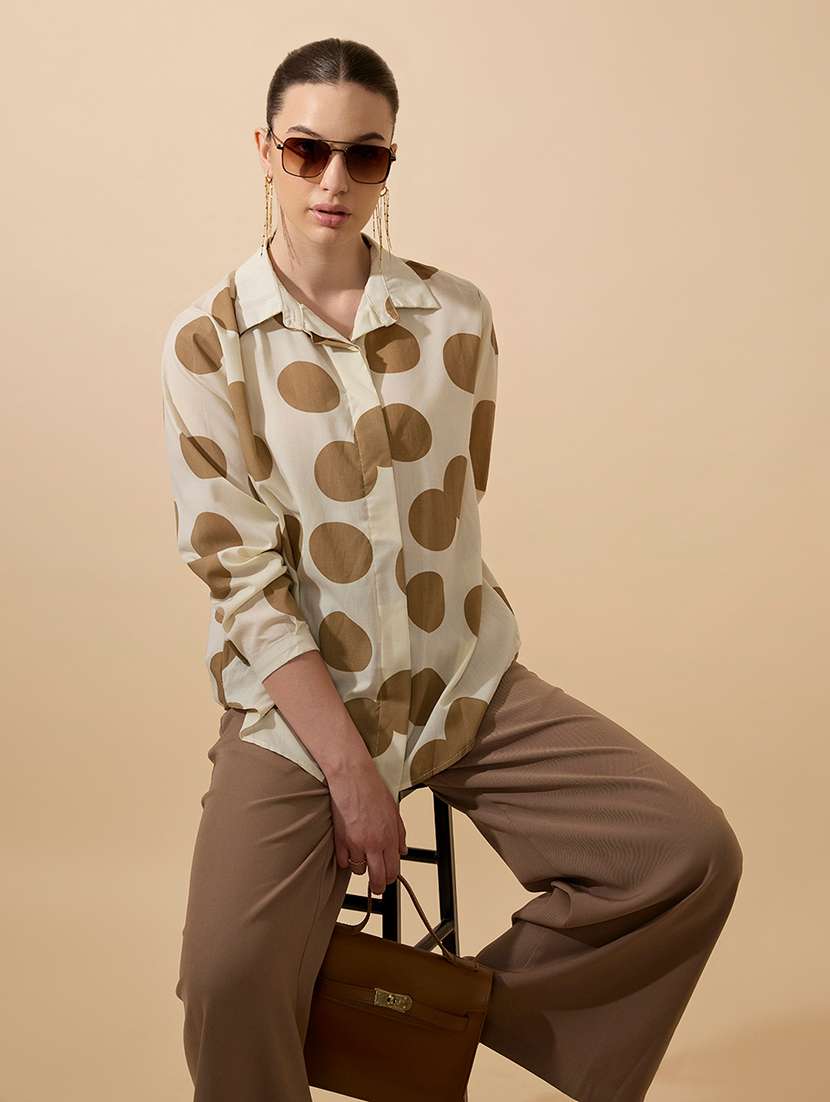 women polka doted collared long sleeve shirt