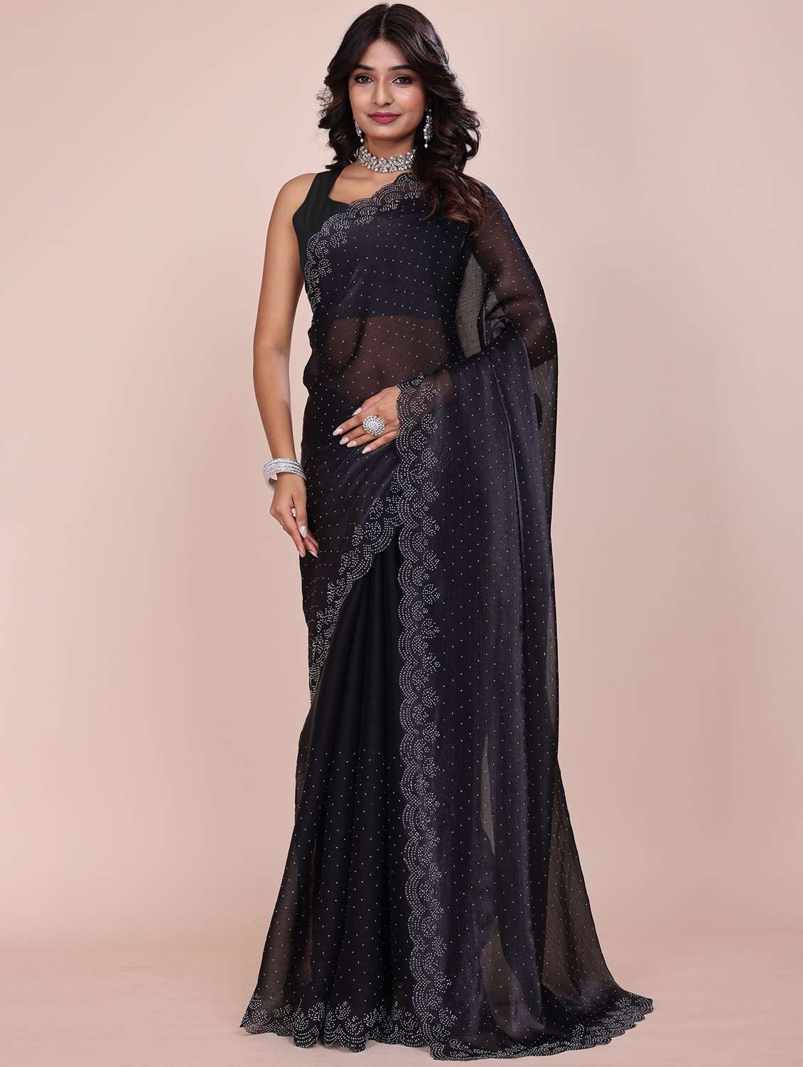 women solid with work embellished saree with blouse