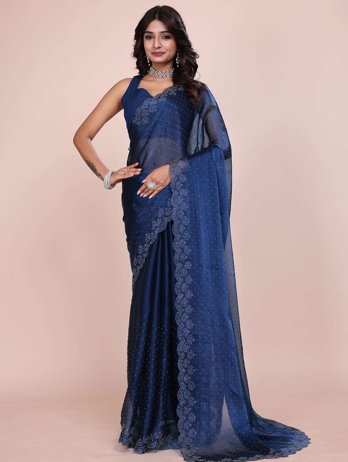 women solid with work embellished saree with blouse