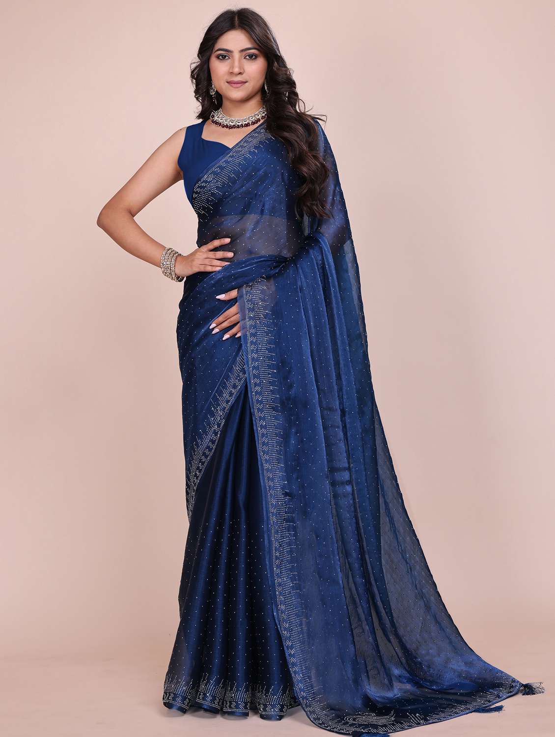 women solid with work embellished saree with blouse