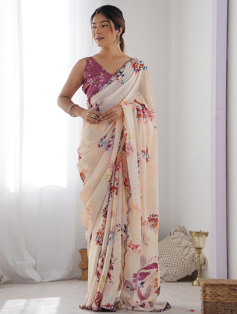 women cream printed saree with blouse