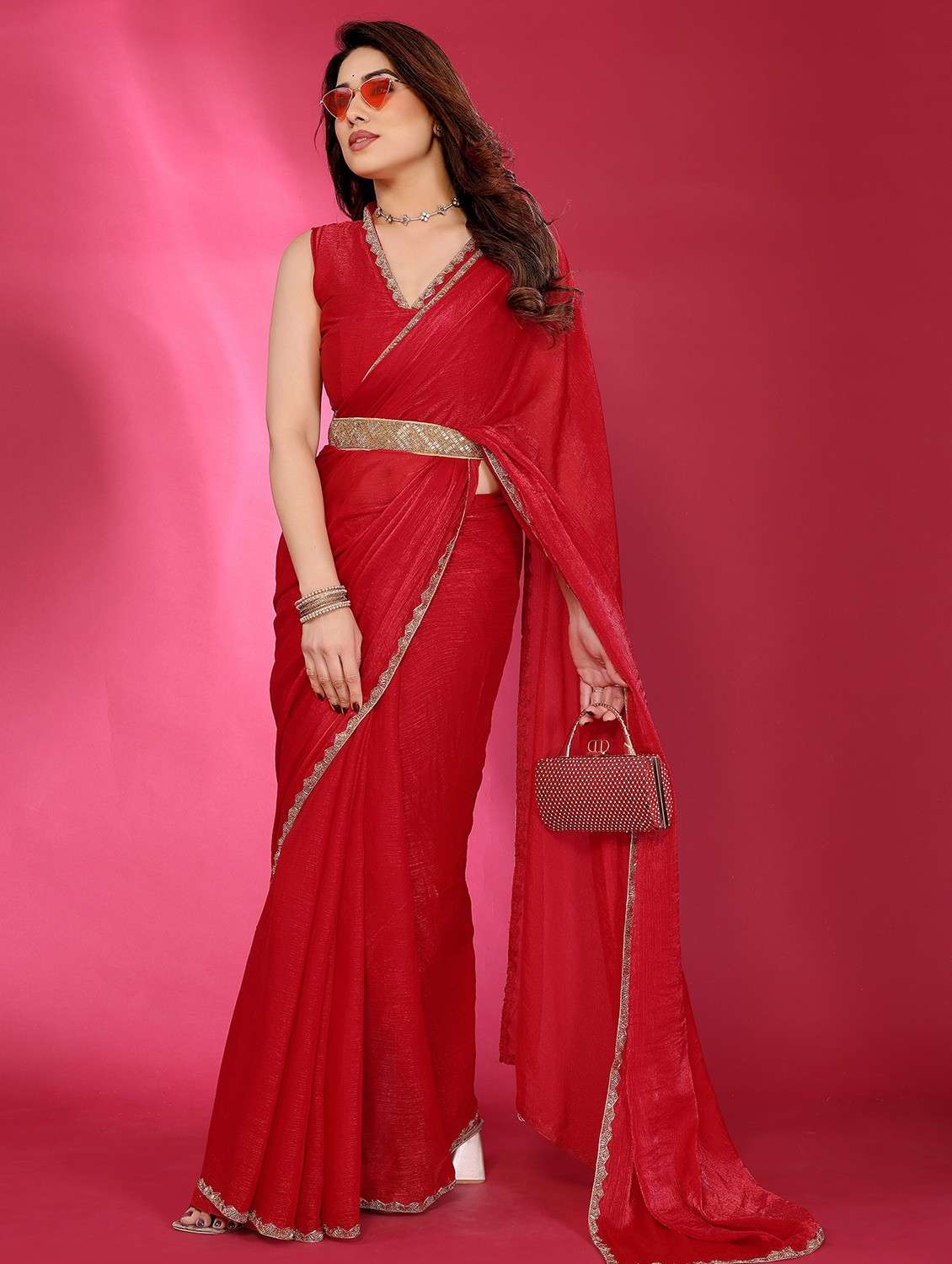 women solid embellished bordered saree with blouse