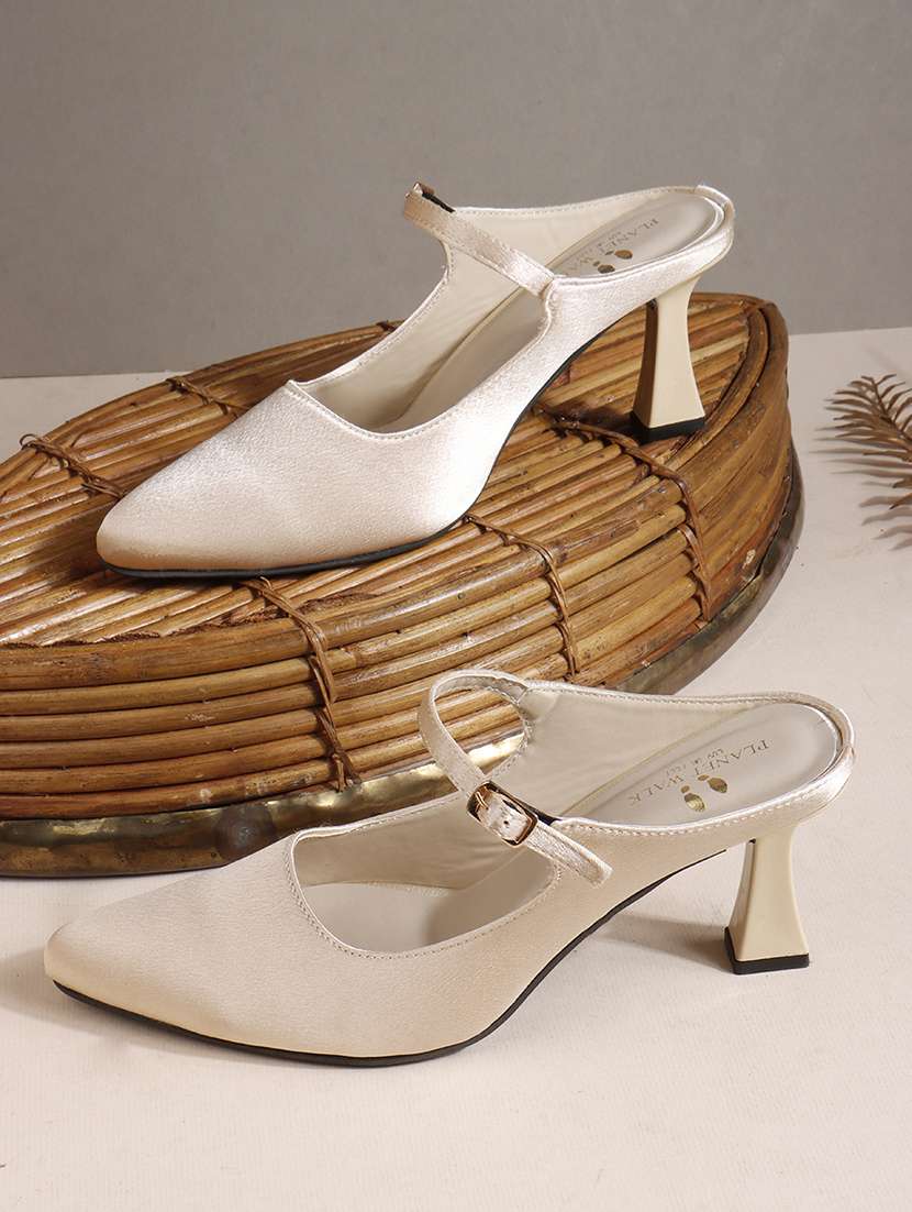 women cream slip on sandal