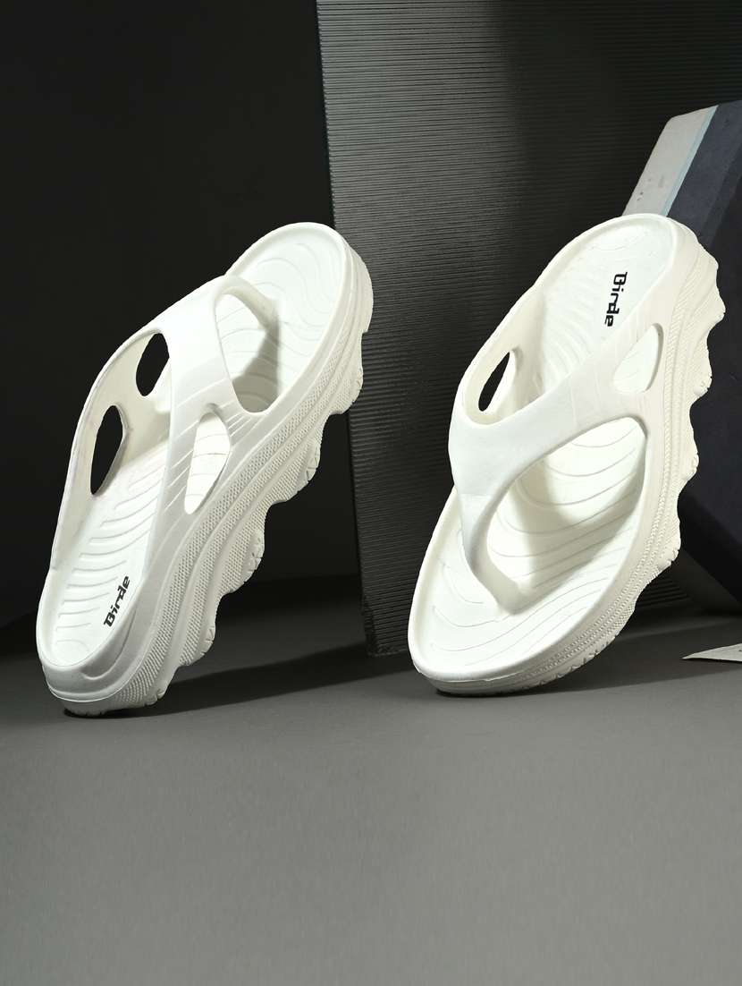 men white toe separator flip flop