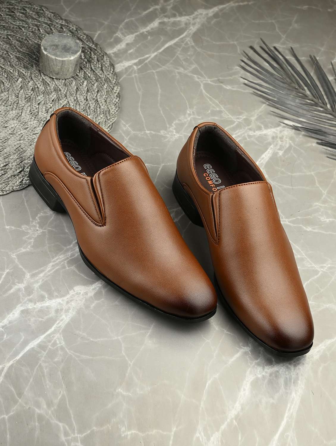 men tan slip on formal shoes