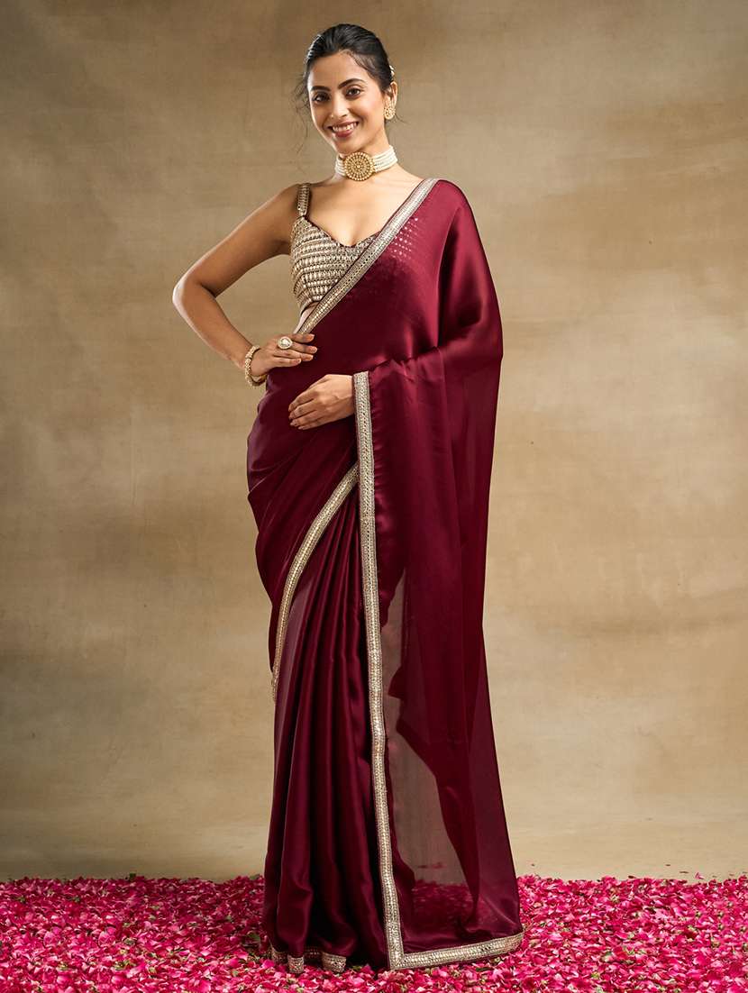 women solid with bordered saree with blouse