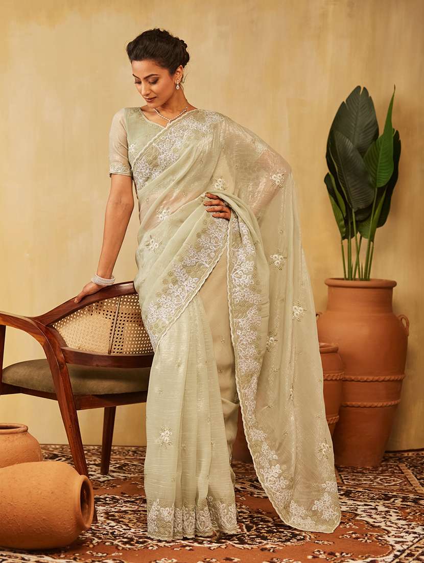 women solid with work embroidered saree with blouse