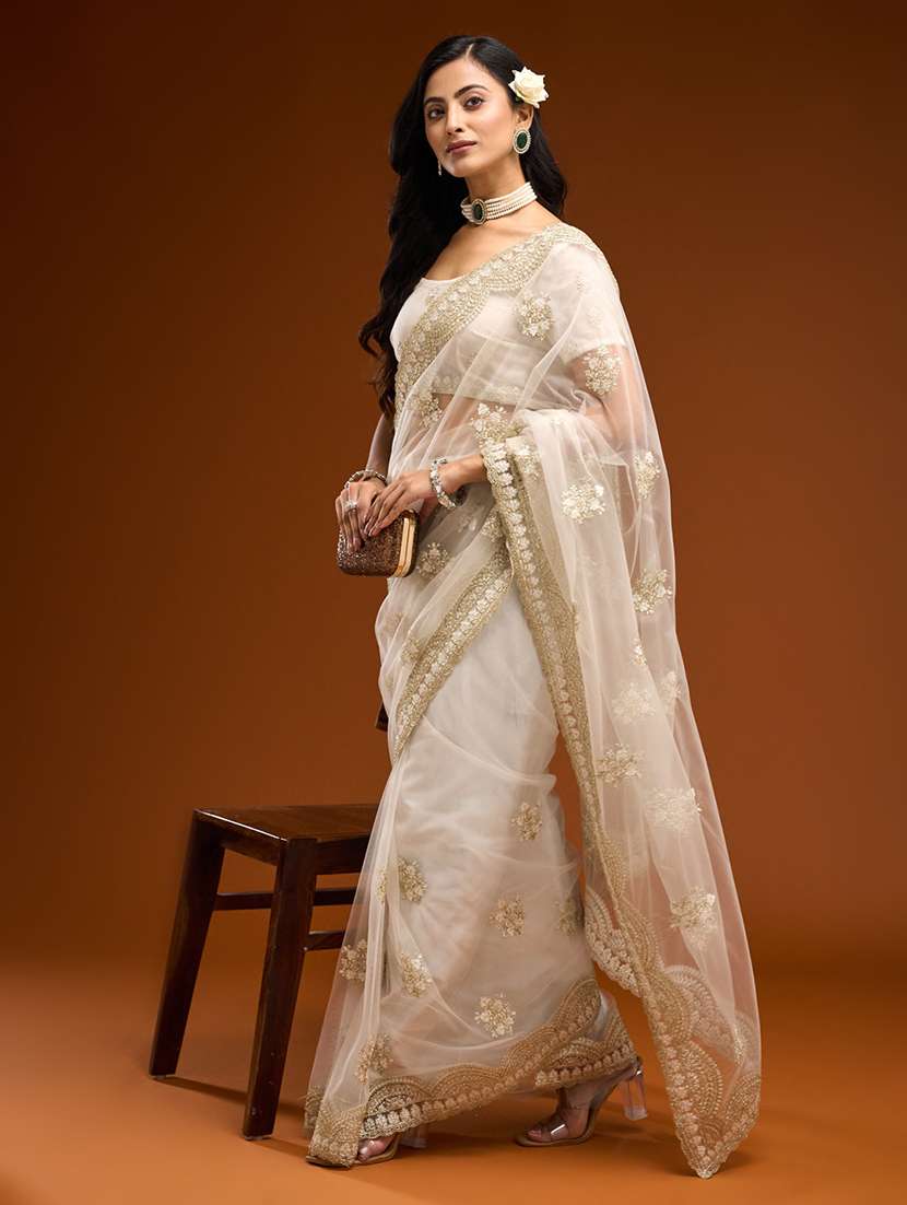 women solid with work embroidered saree with blouse
