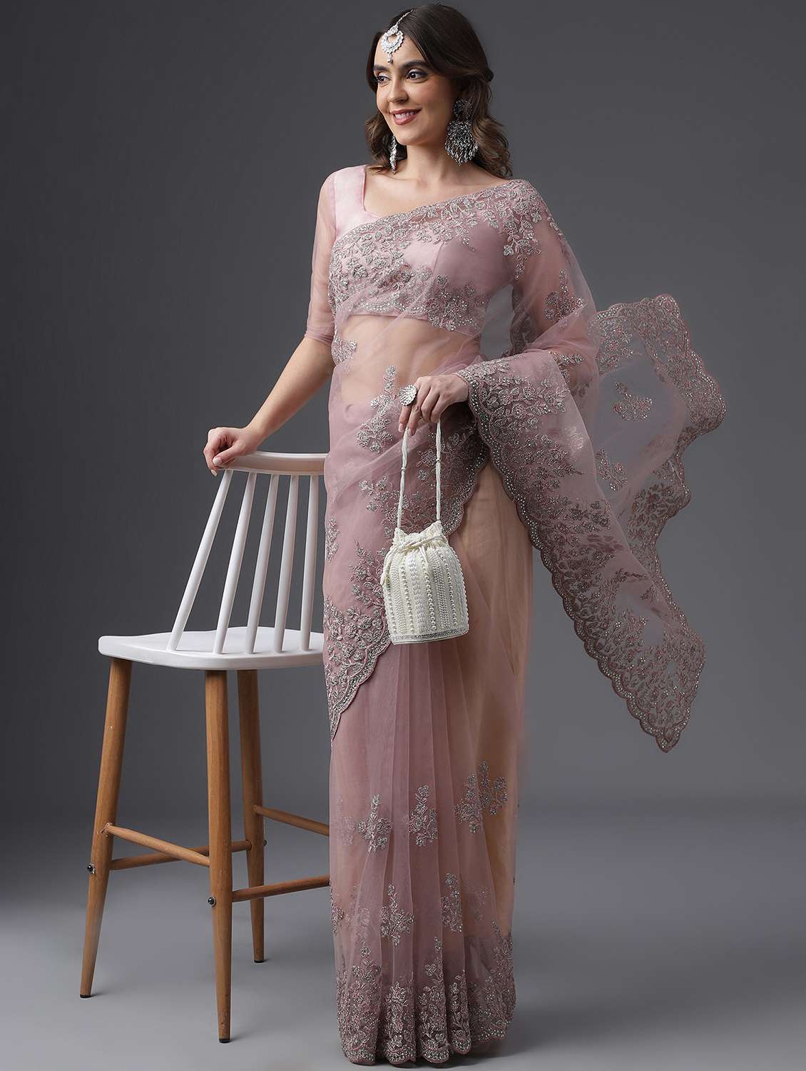 women solid with work embroidered saree with blouse