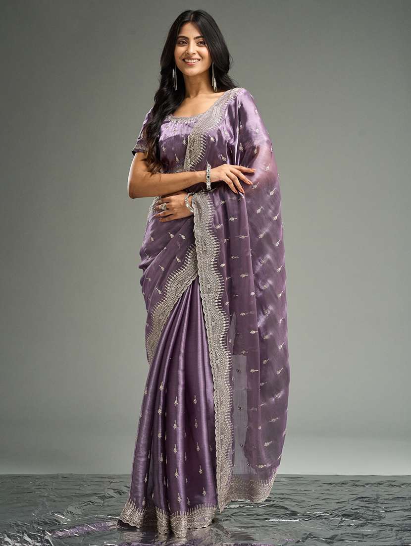 women solid with work embroidered saree with blouse