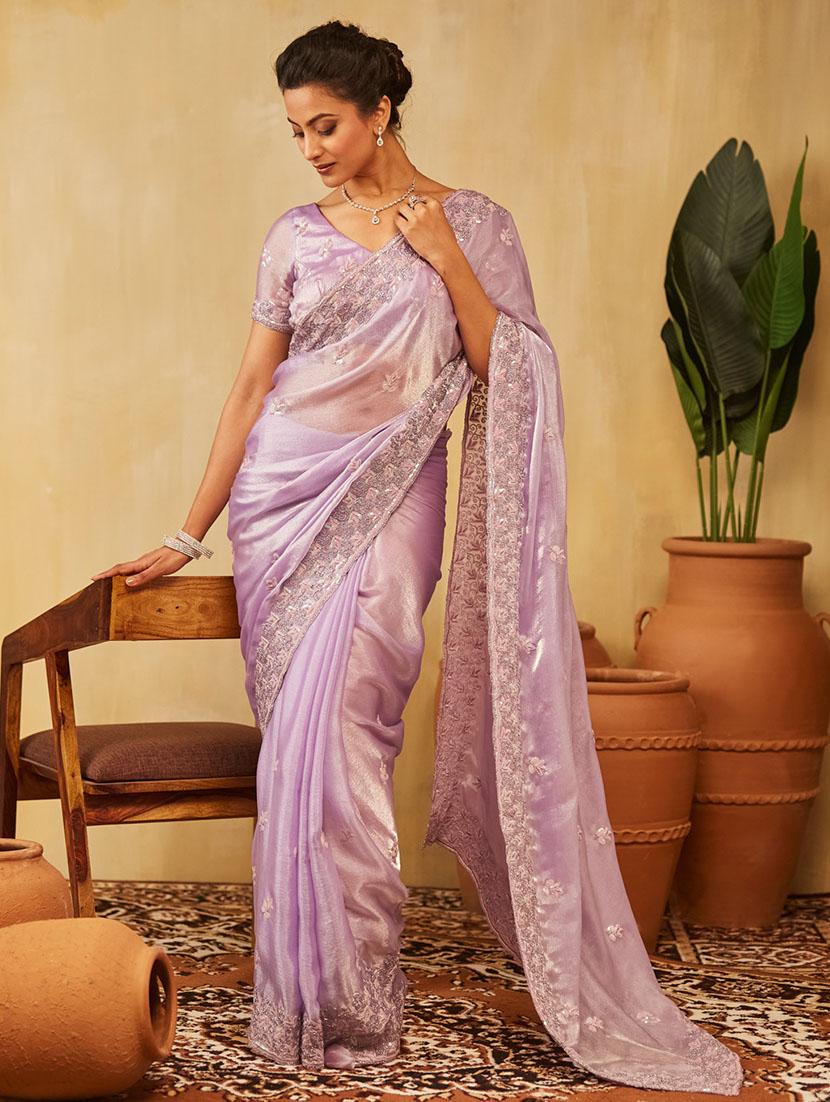 women solid with work embroidered saree with blouse