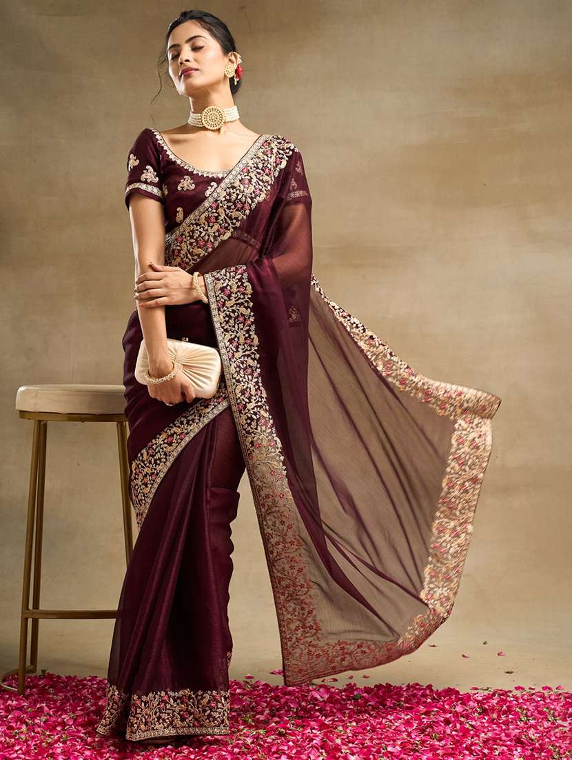 women solid with bordered saree with blouse