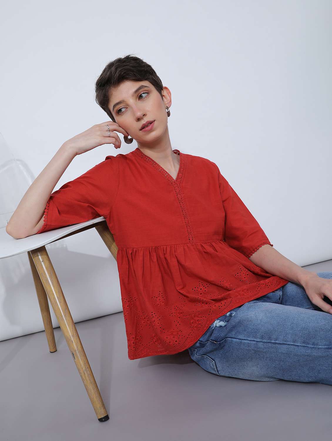 women red solid short sleeve schiffli flared top - 21951393 -  Zoom Image - 0