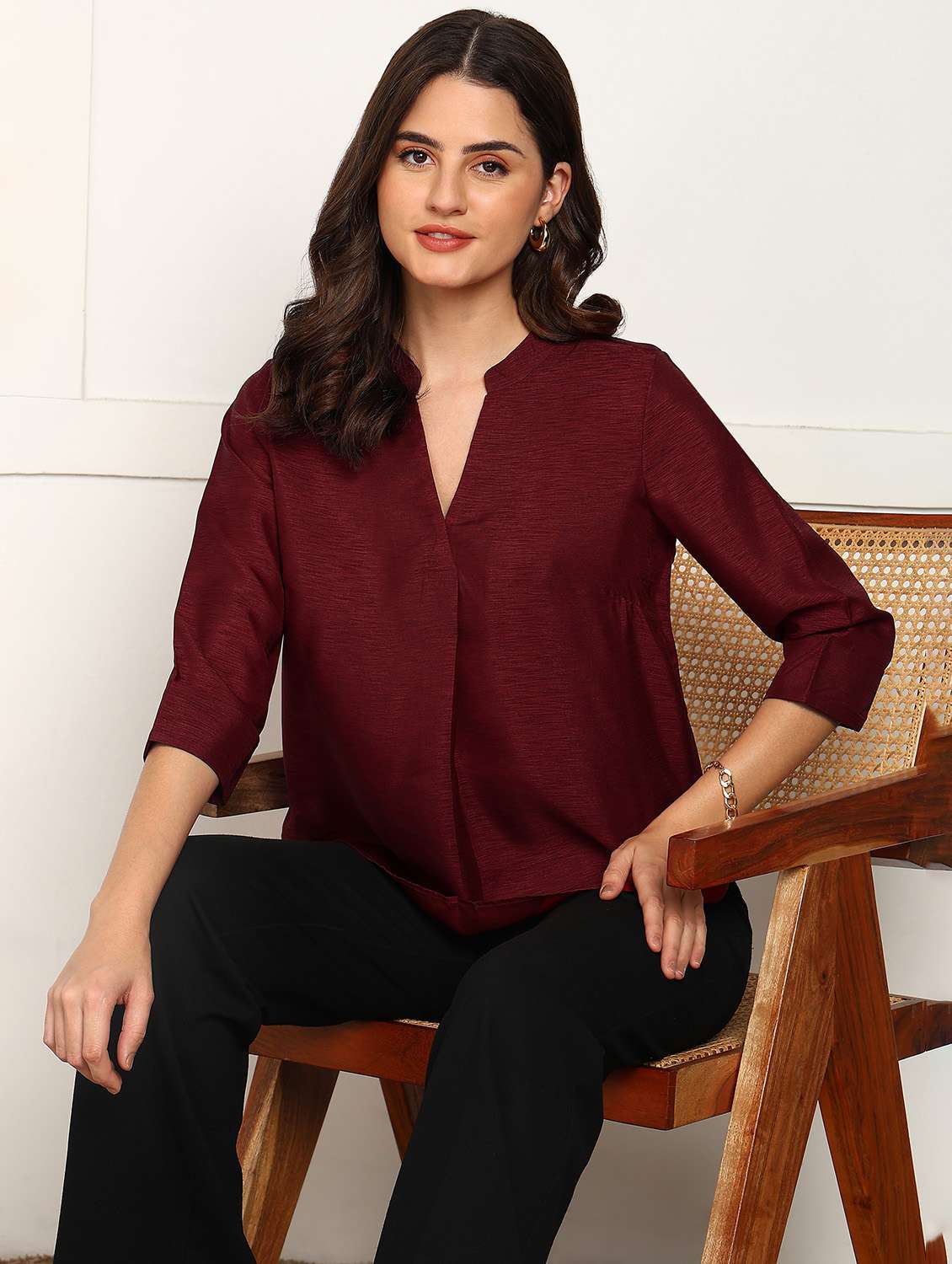 women maroon solid three quarter sleeve ethnic top