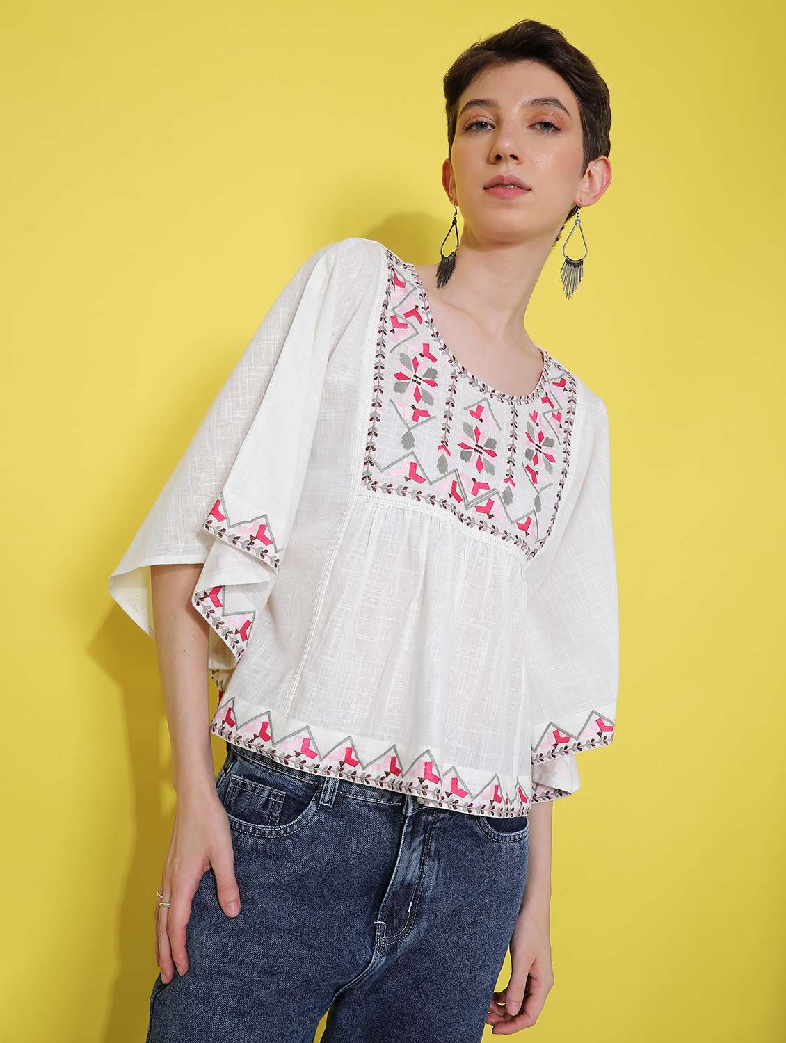 women white embroidered flared sleeve top